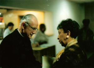 An old picture of a church father meeting a woman